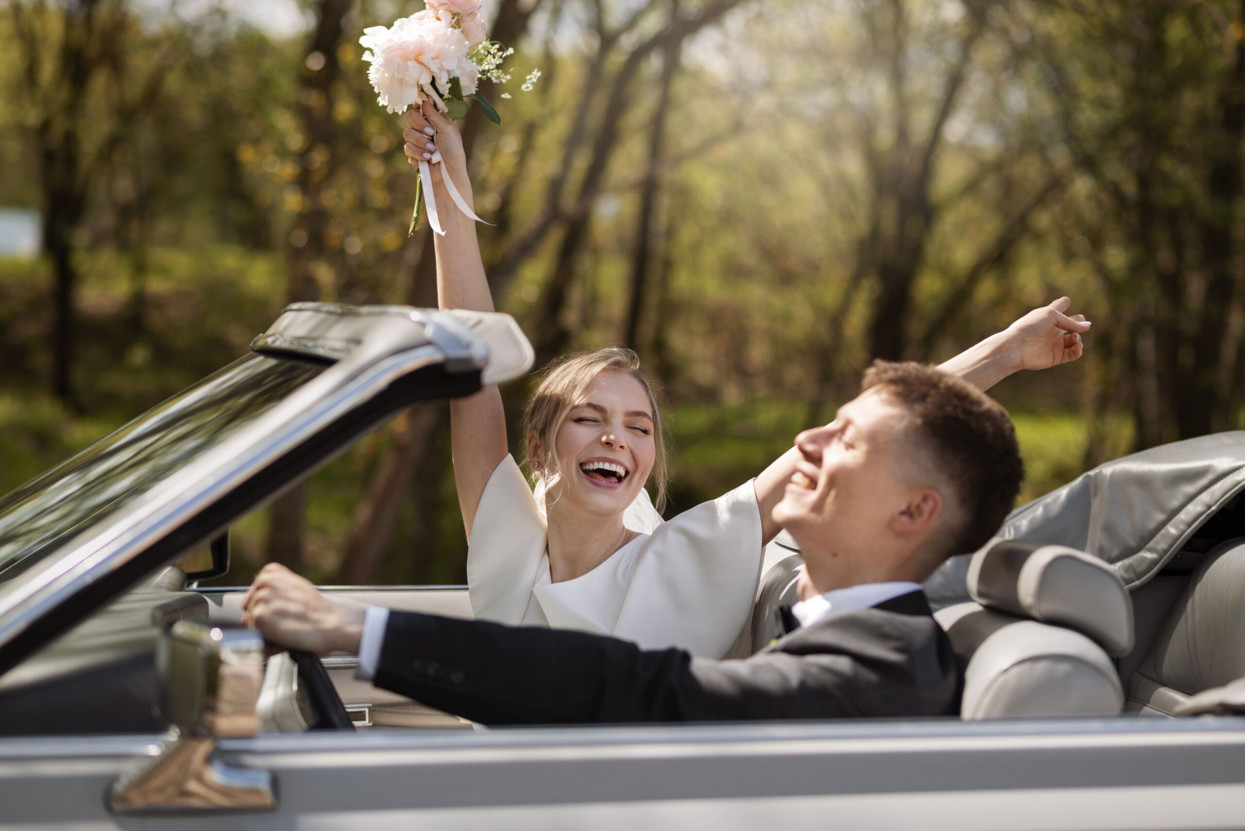 couple-celebrating-their-just-married-car (1)